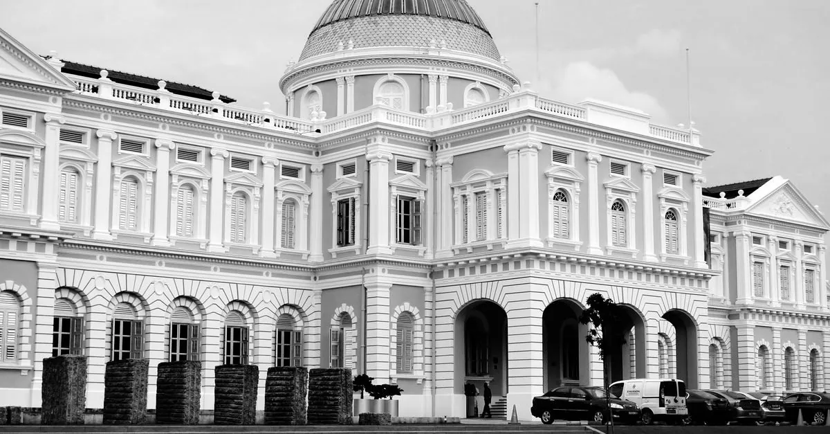 Black and white view of the National Museum of Singapore facade and dome