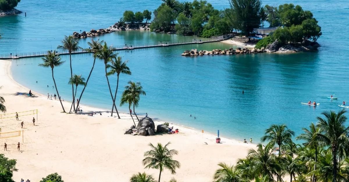 Sandy beach and turquoise water on Sentosa island